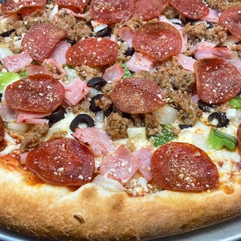 Indulge in Our Supreme Pizza